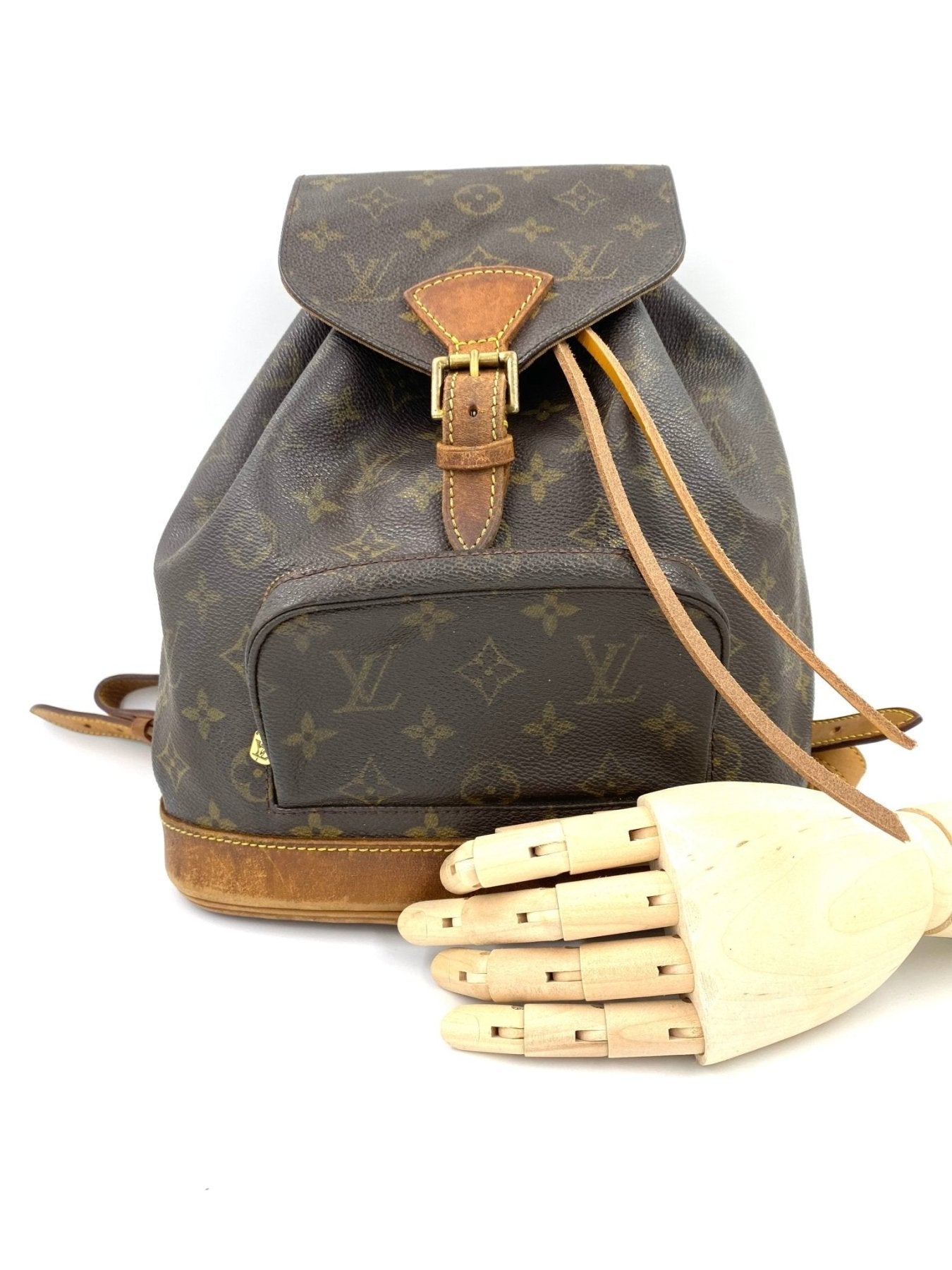 Louis Vuitton Montsouris MM Rucksack in Monogram Canvas mit braunen Lederdetails und Fronttasche, klassisches Design