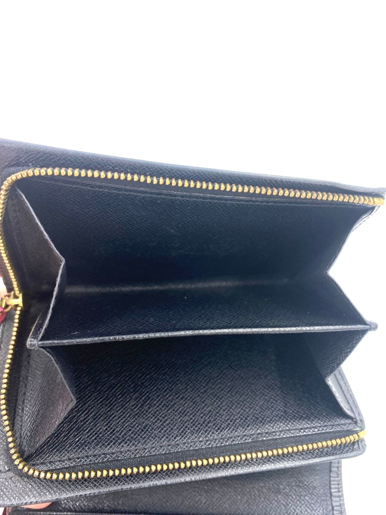 Louis Vuitton Portemonnaie Tresor Epi noir Geldborse aus schwarzem Epileder mit Reissverschluss und inneren Fachern