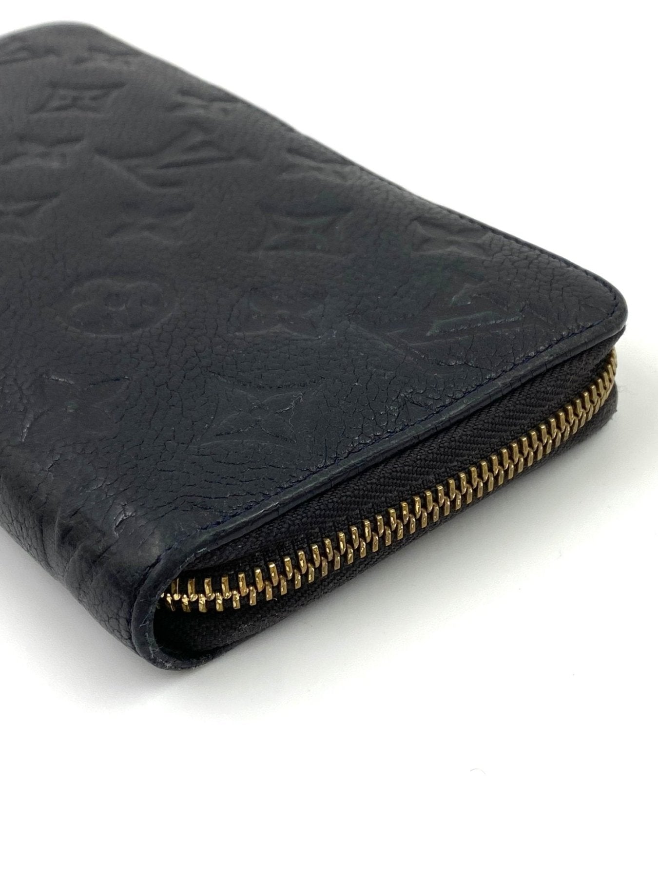 Louis Vuitton Zippy Monogram Empreinte Geldborse in schwarz mit gepragtem Leder und goldenem Reissverschluss