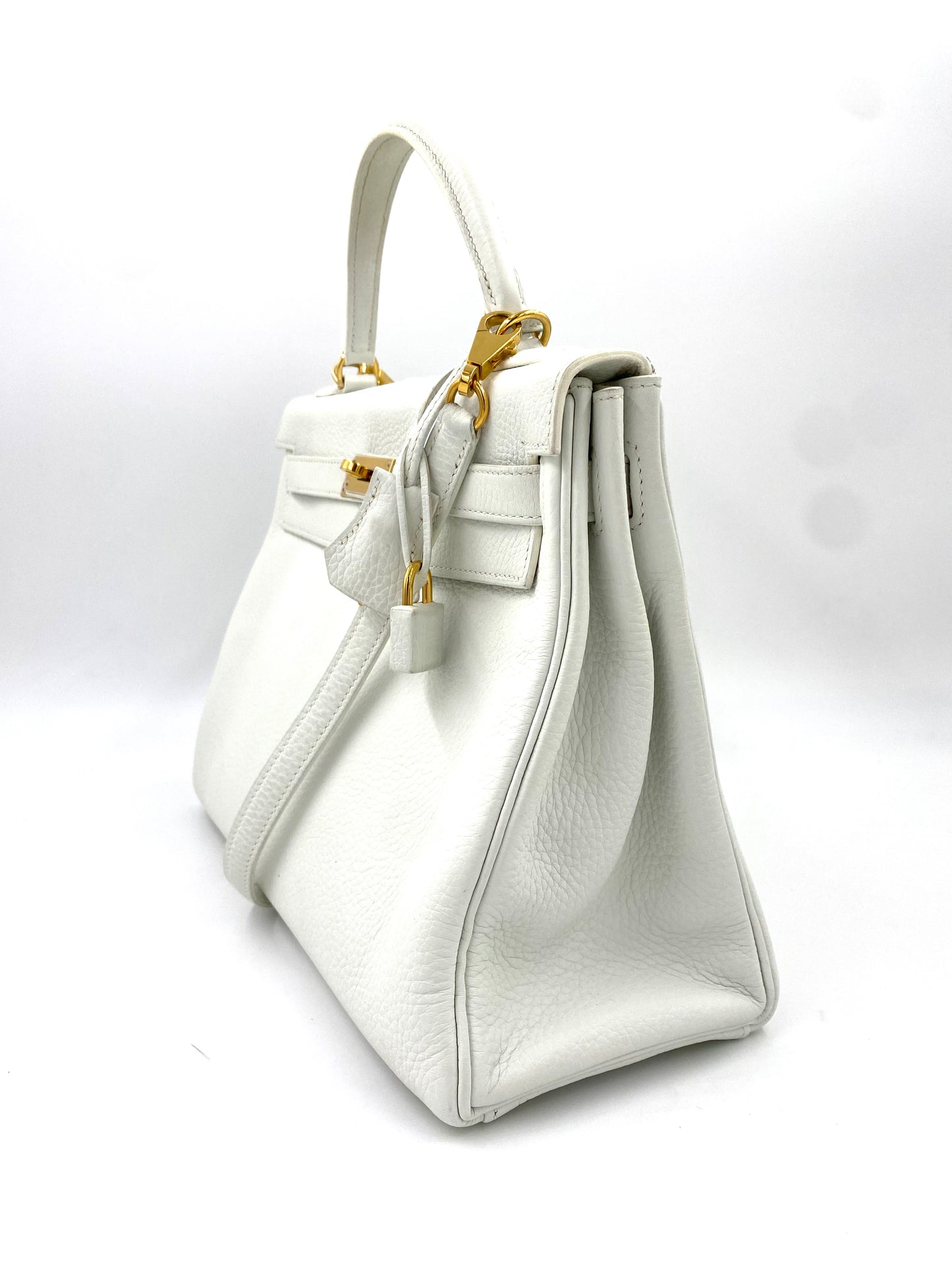HERMÈS Kelly 32 Retourne Clemence-Leder Blanc mit gold Hardware