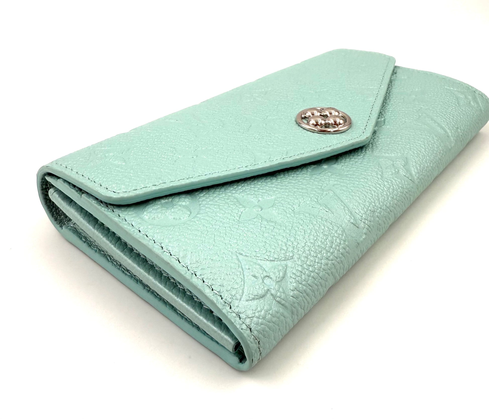 Louis Vuitton Sarah Flower NM mint Portemonnaie aus mintfarbenem Leder mit silberfarbenem Flower-Verschluss, neuwertig.