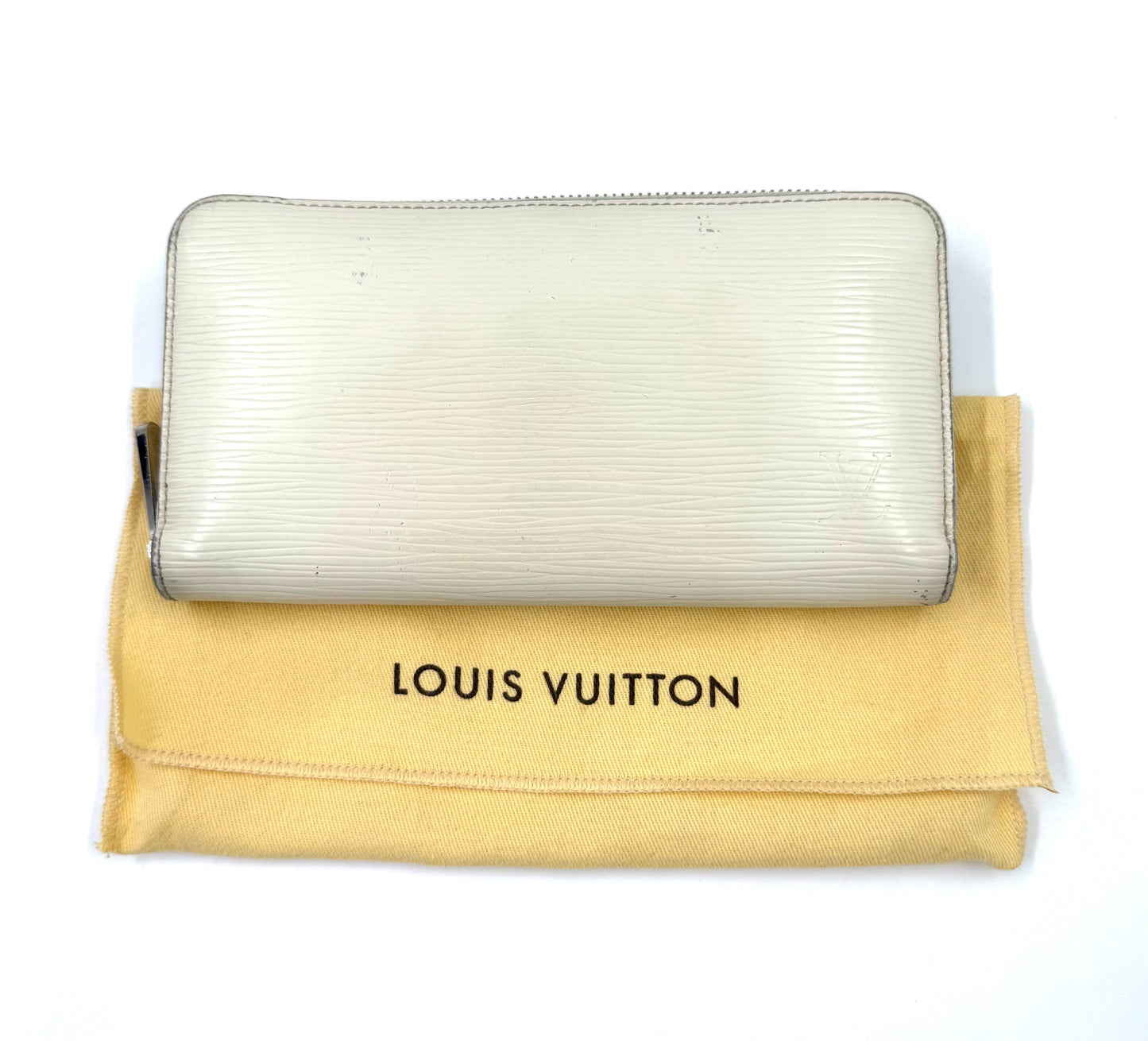 LOUIS VUITTON Zippy Epi ivory Geldbörse aus Epi-Leder mit Gebrauchsspuren und Reißverschluss auf Staubbeutel.