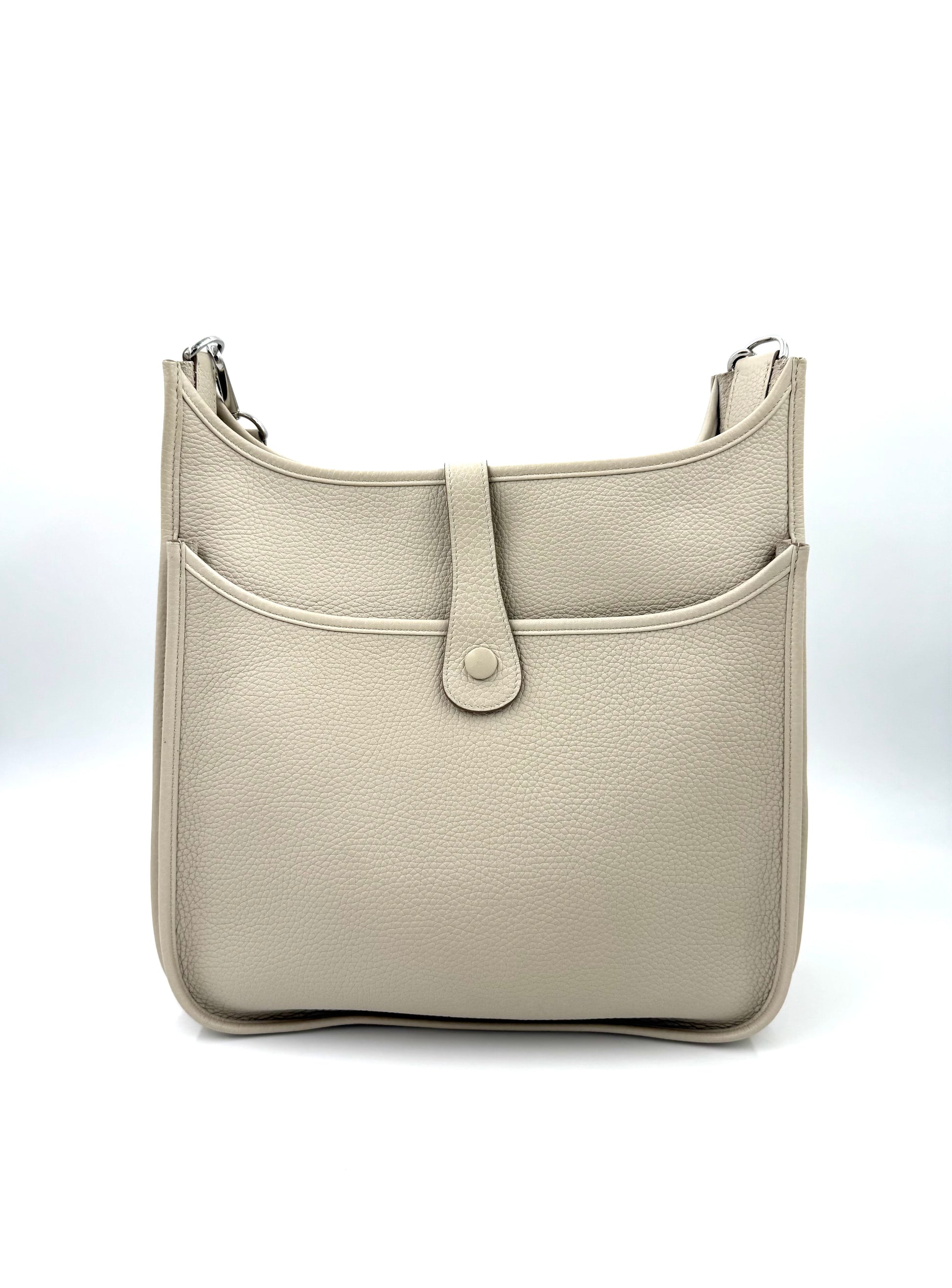 HERMÈS Evelyne 33 Beton Clemenceleder, elegante graue Luxustasche aus hochwertigem Taurillon-Leder mit verstellbarem Schulterriemen.
