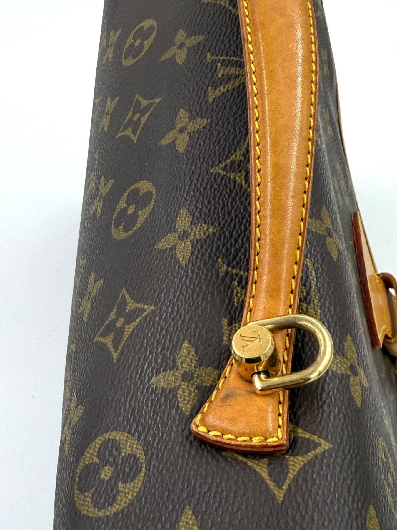 Vintage Louis Vuitton Bel Air Monogram Canvas Tasche mit klassischem LV-Muster und honigfarbenem Lederbesatz, Goldschnalle.