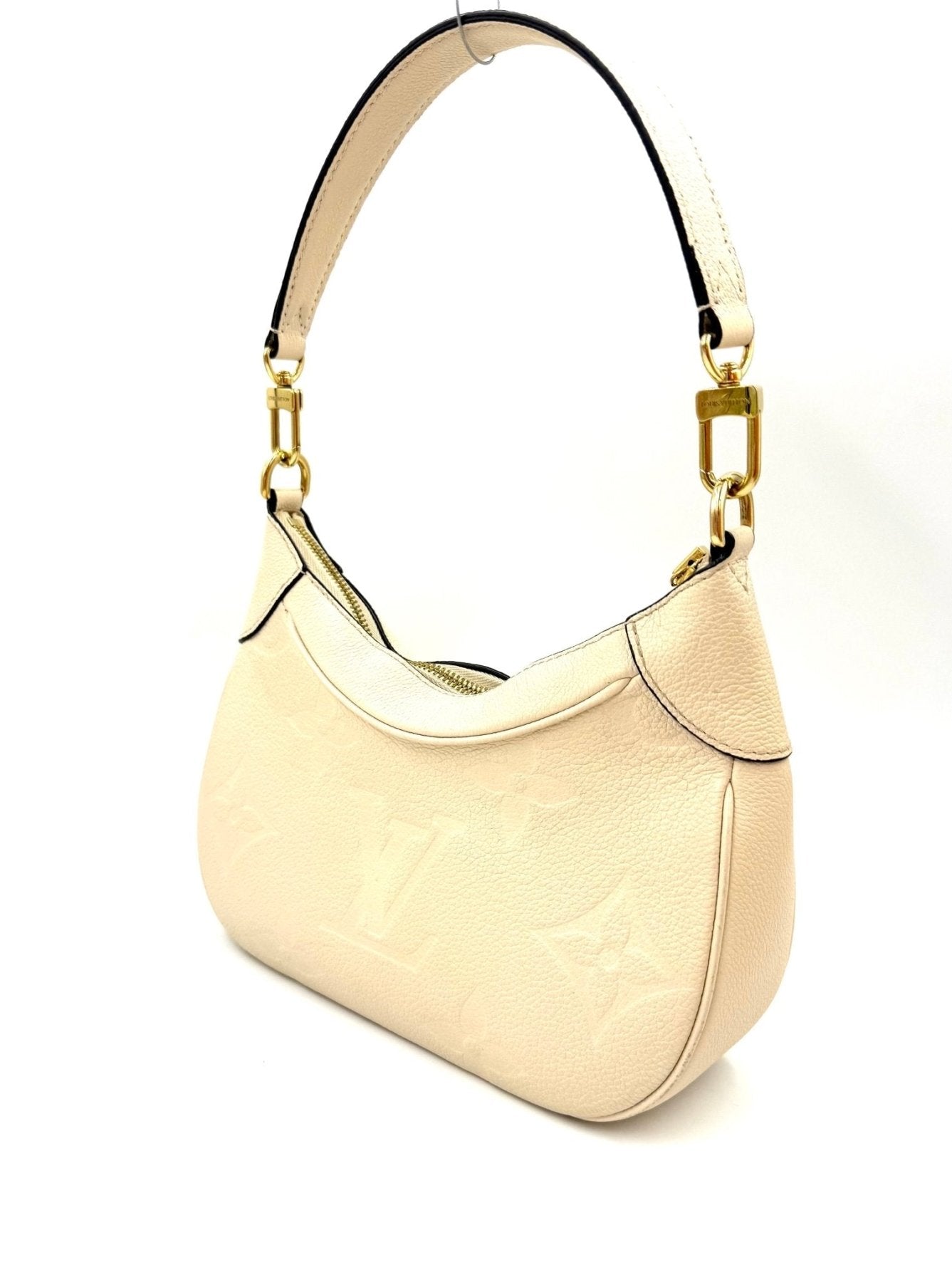 Louis Vuitton Bagatelle Monogram Empreinte Handtasche in Creme mit gepraegtem Logo und goldfarbenen Beschlaegen