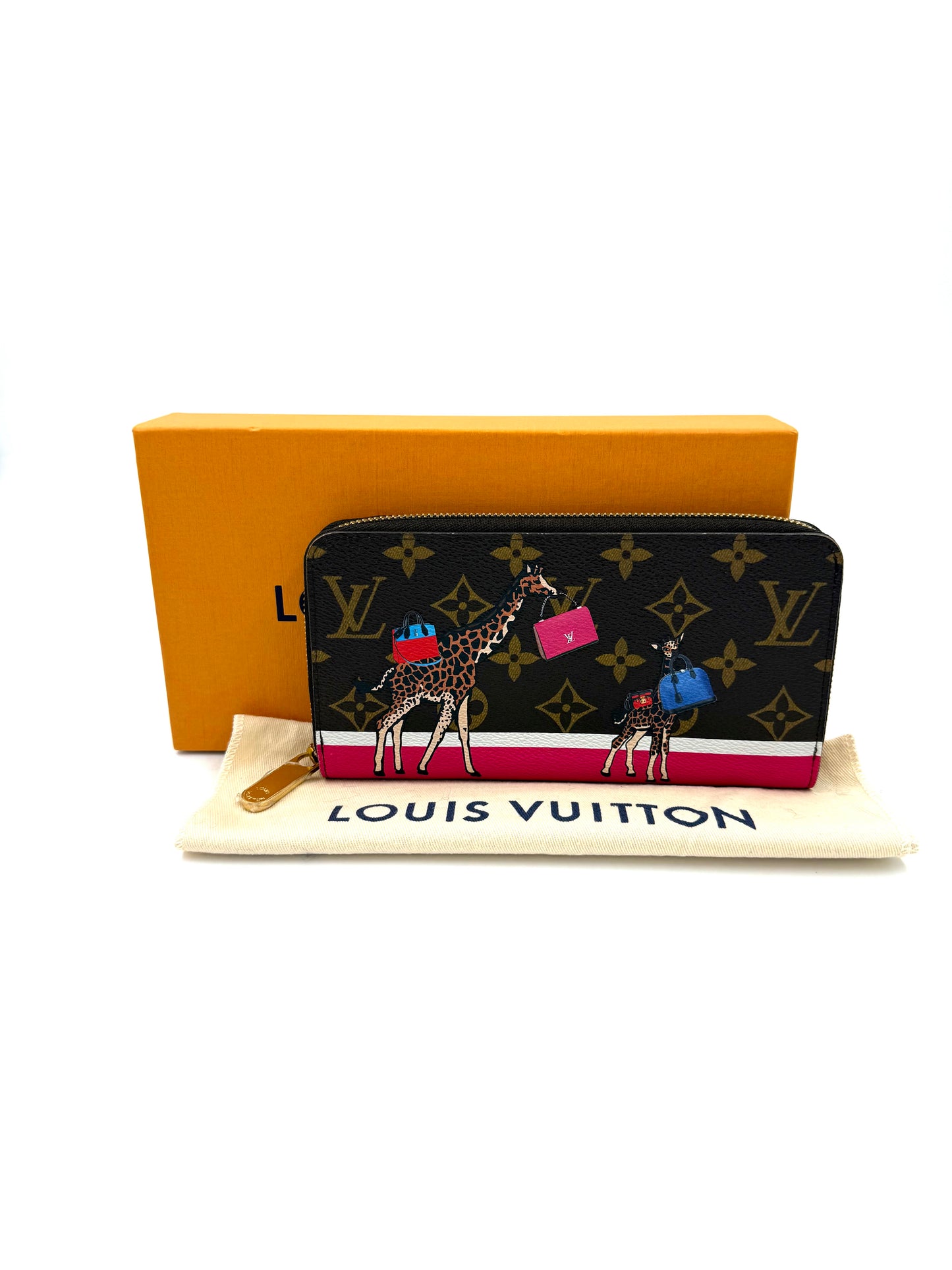 LOUIS VUITTON Zippy xmas Animation 2017 Geldbörse aus Canvas mit Giraffen-Motiv, neuwertig und glänzenden Metallbeschlägen.