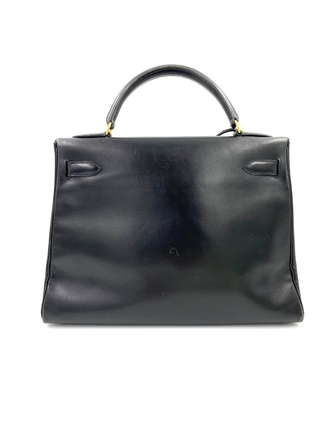 HERMÈS Kelly 32 Boxkalbsleder schwarz Handtasche in klassischem Design mit goldfarbener Hardware und Tragegriff