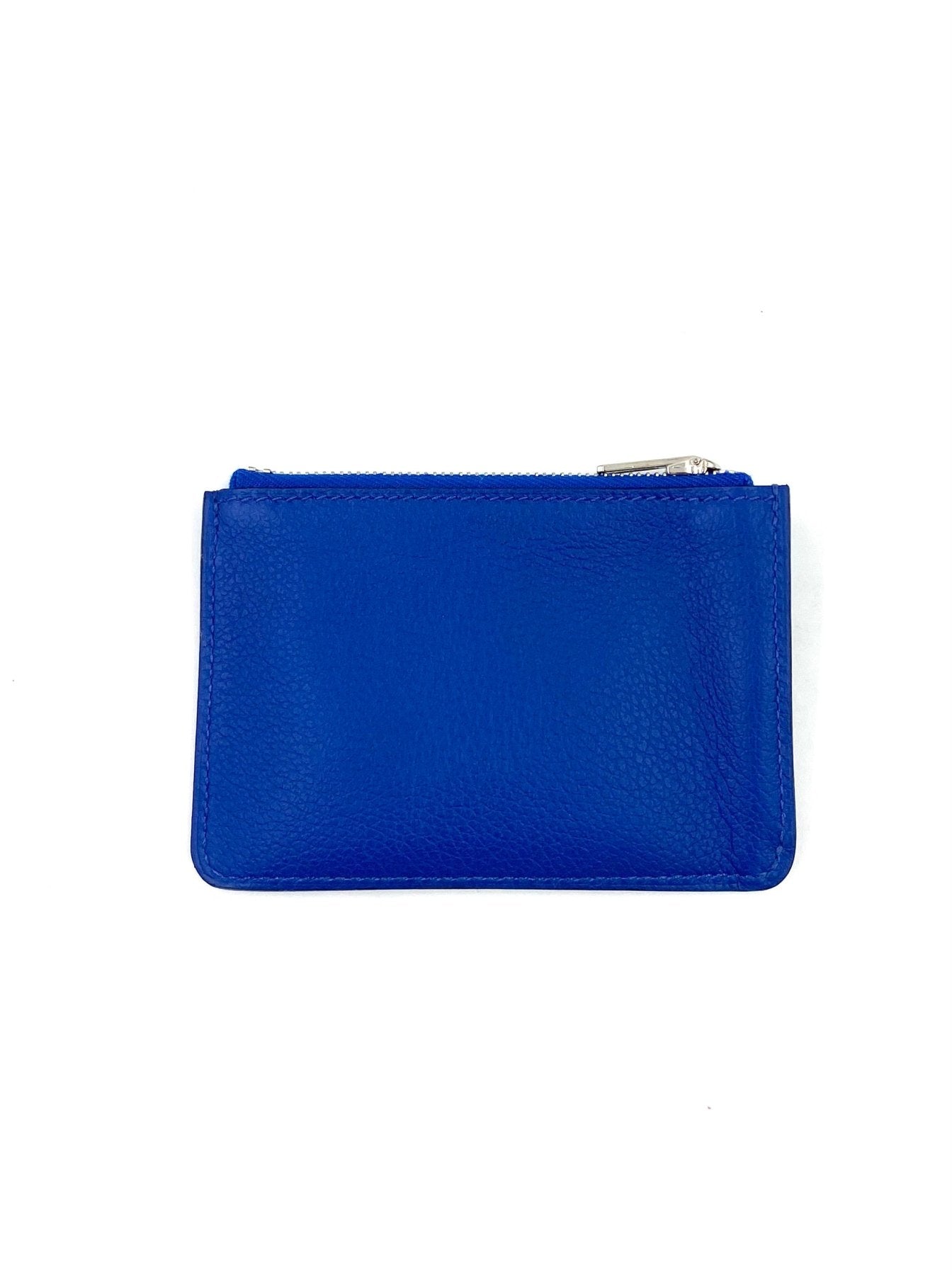 HERMÈS Constance Slim Geldbörse in Blue de France mit Palladium Hardware, fotografiert auf weissem Hintergrund