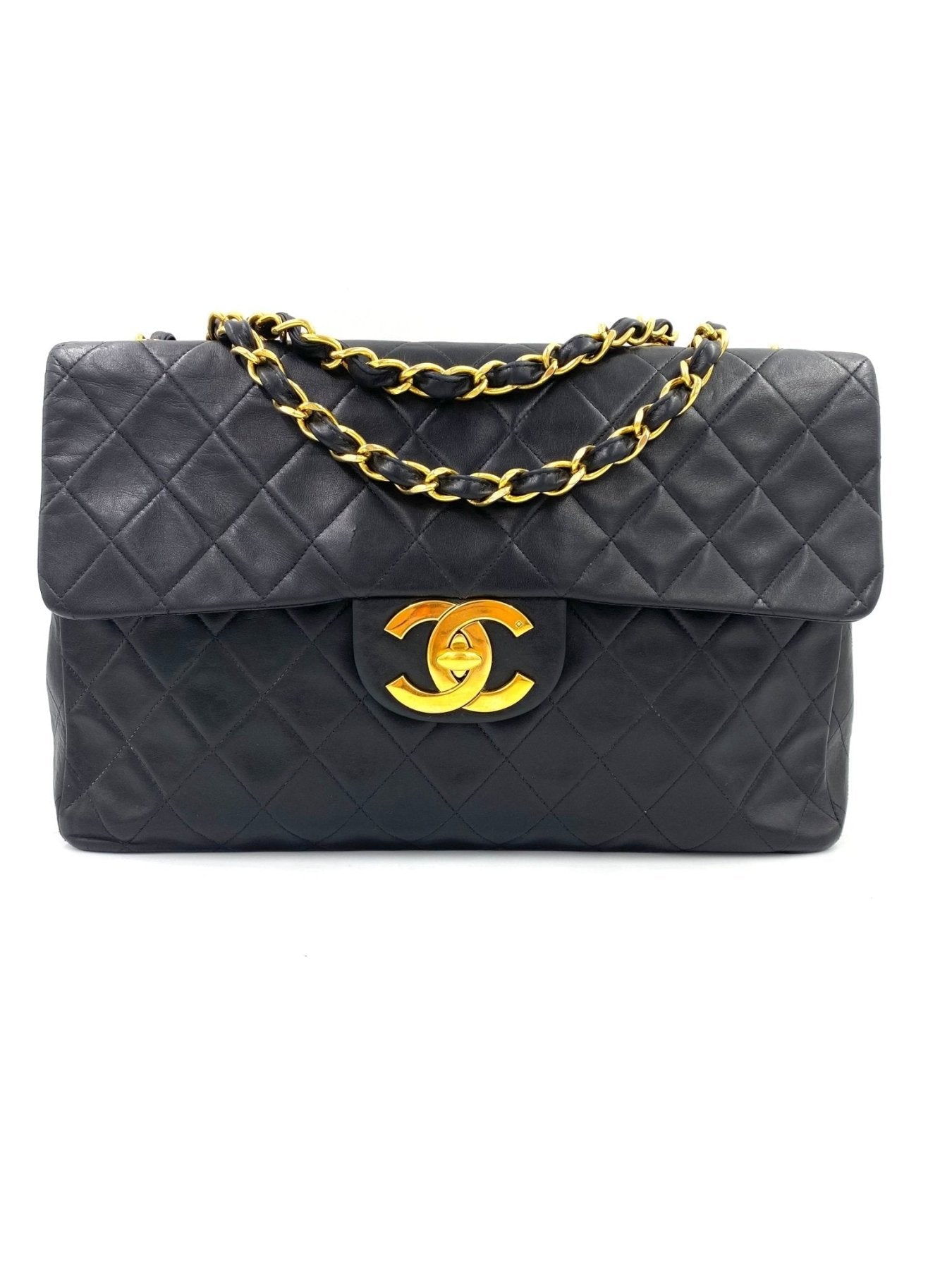 CHANEL Timeless Single Flap Bag Maxi in schwarzem Lammleder mit goldenem CC-Logo und Kettengurt, gestepptes Design