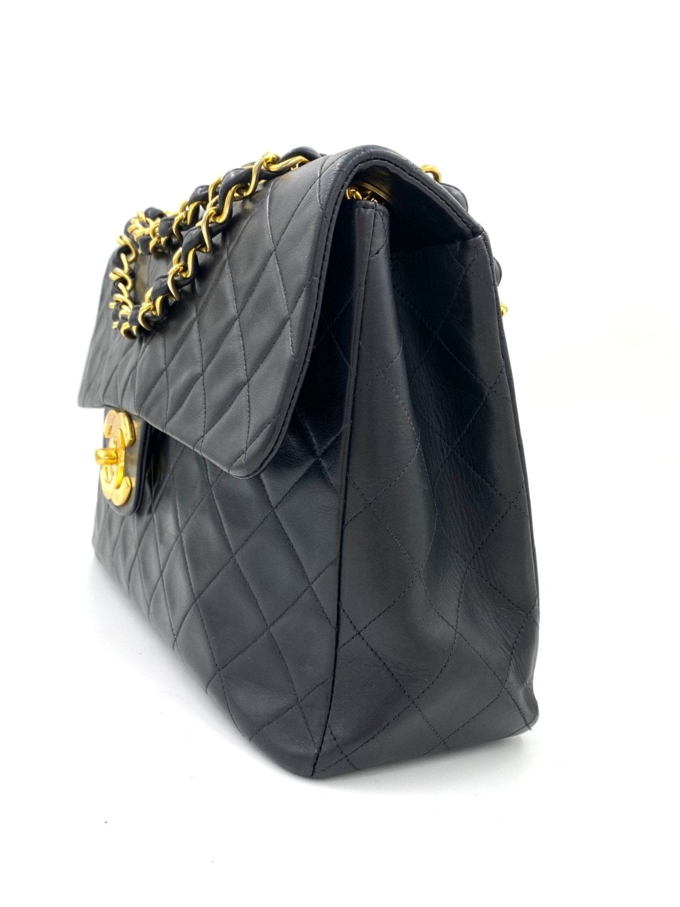 Chanel Timeless Single Flap Bag Maxi schwarz mit gestepptem Lammleder, goldener Kette und oversized CC-Verschluss
