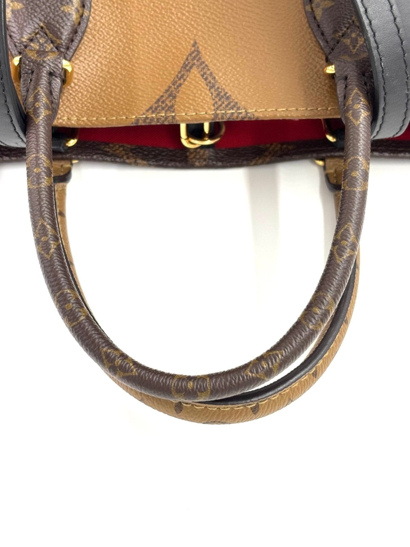 Louis Vuitton Onthego MM Monogram Giant Handtasche mit Lederhenkel und charakteristischem LV-Muster in braun und beige
