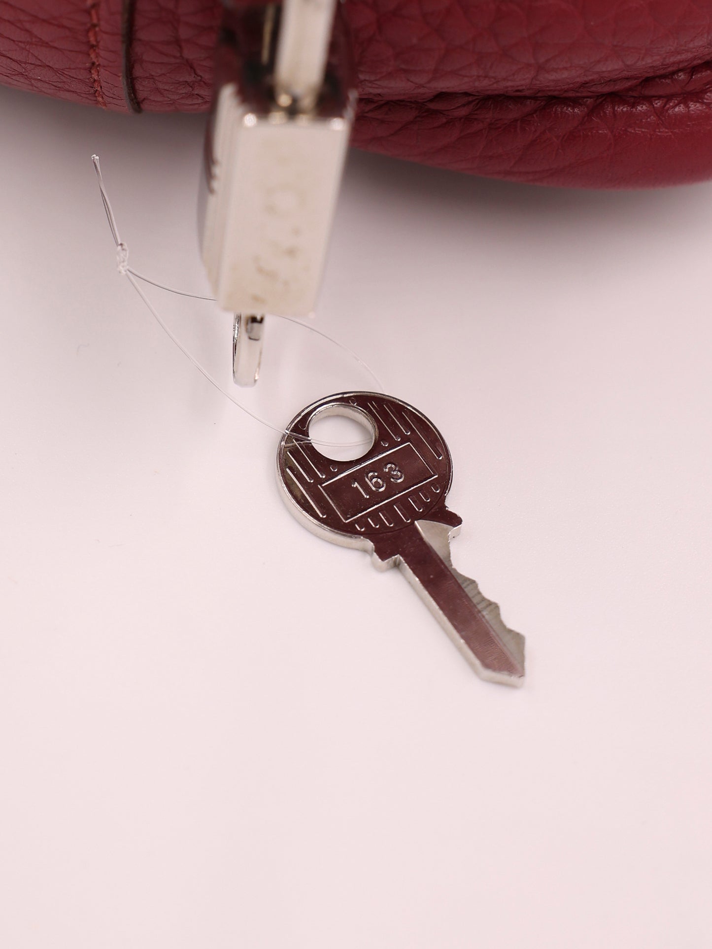 HERMÈS Picotin 18 Lock Clemence Dunklerot PHW