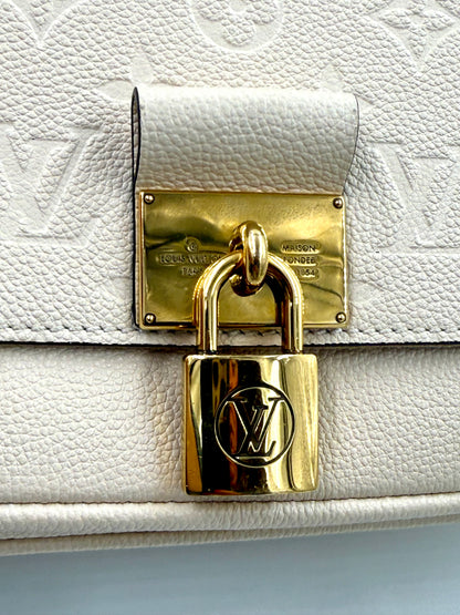 Louis Vuitton Marignan Monogram Empreinte creme