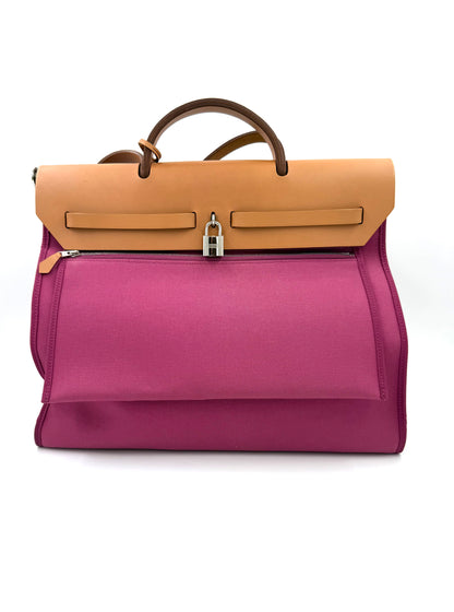 Vorderansicht der HERMÈS Herbag 39 Zip pink mit braunen Ledergriffen, hochwertige Designer Handtasche second hand