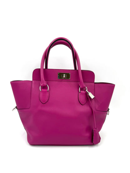 HERMÈS Toolbox 22 fuchsia PHW Handtasche aus edlem Leder in kräftigem Pink mit silbernen Details und elegantem Design