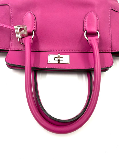 Hochwertige HERMÈS Toolbox 22 fuchsia PHW Designer-Handtasche aus Leder in lebendigem Pink, Secondhand-Edition.