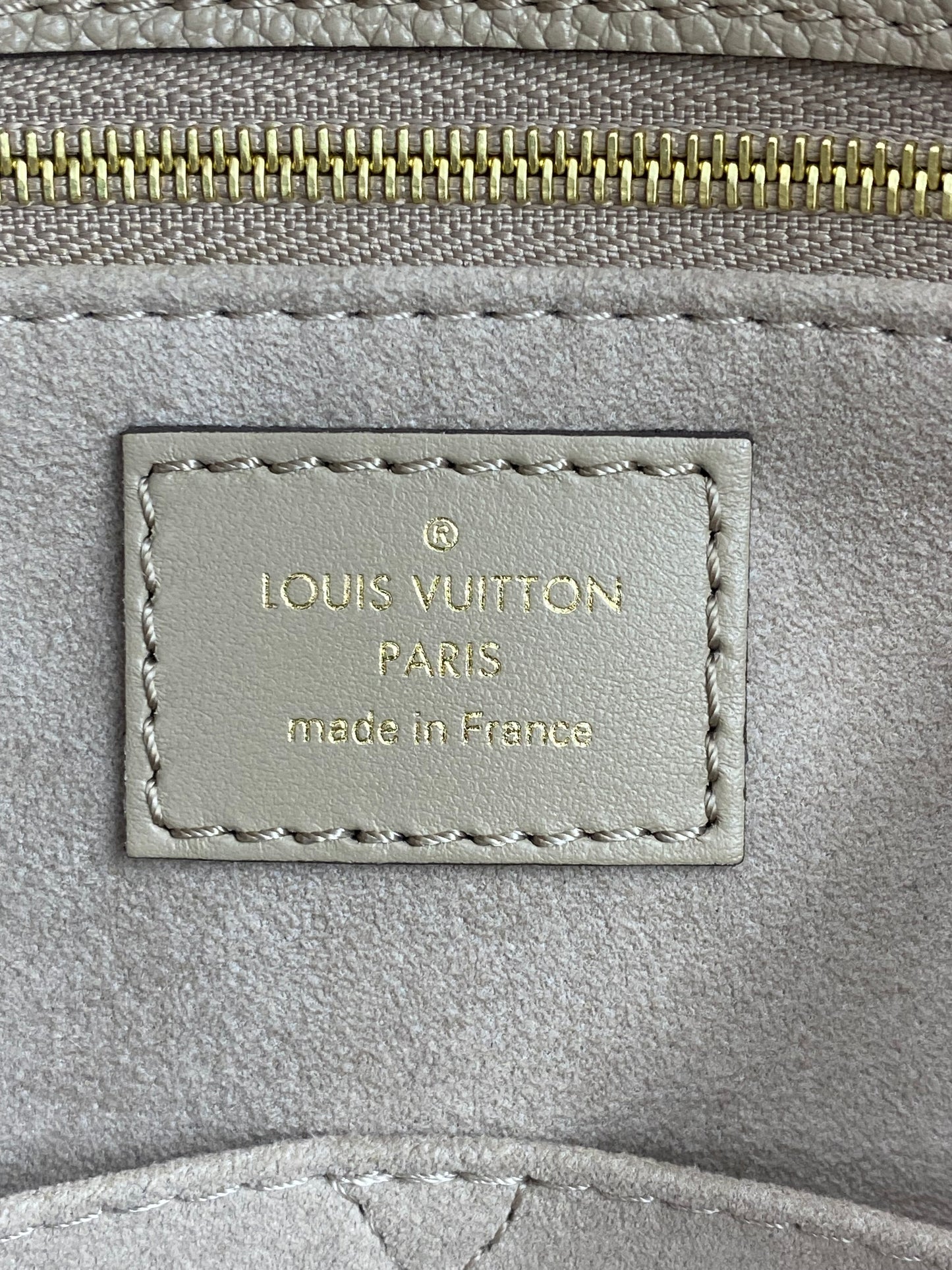 LOUIS VUITTON Onthego MM Monogram Empreinte Tourterelle