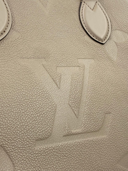 LOUIS VUITTON Onthego MM Monogram Empreinte Tourterelle