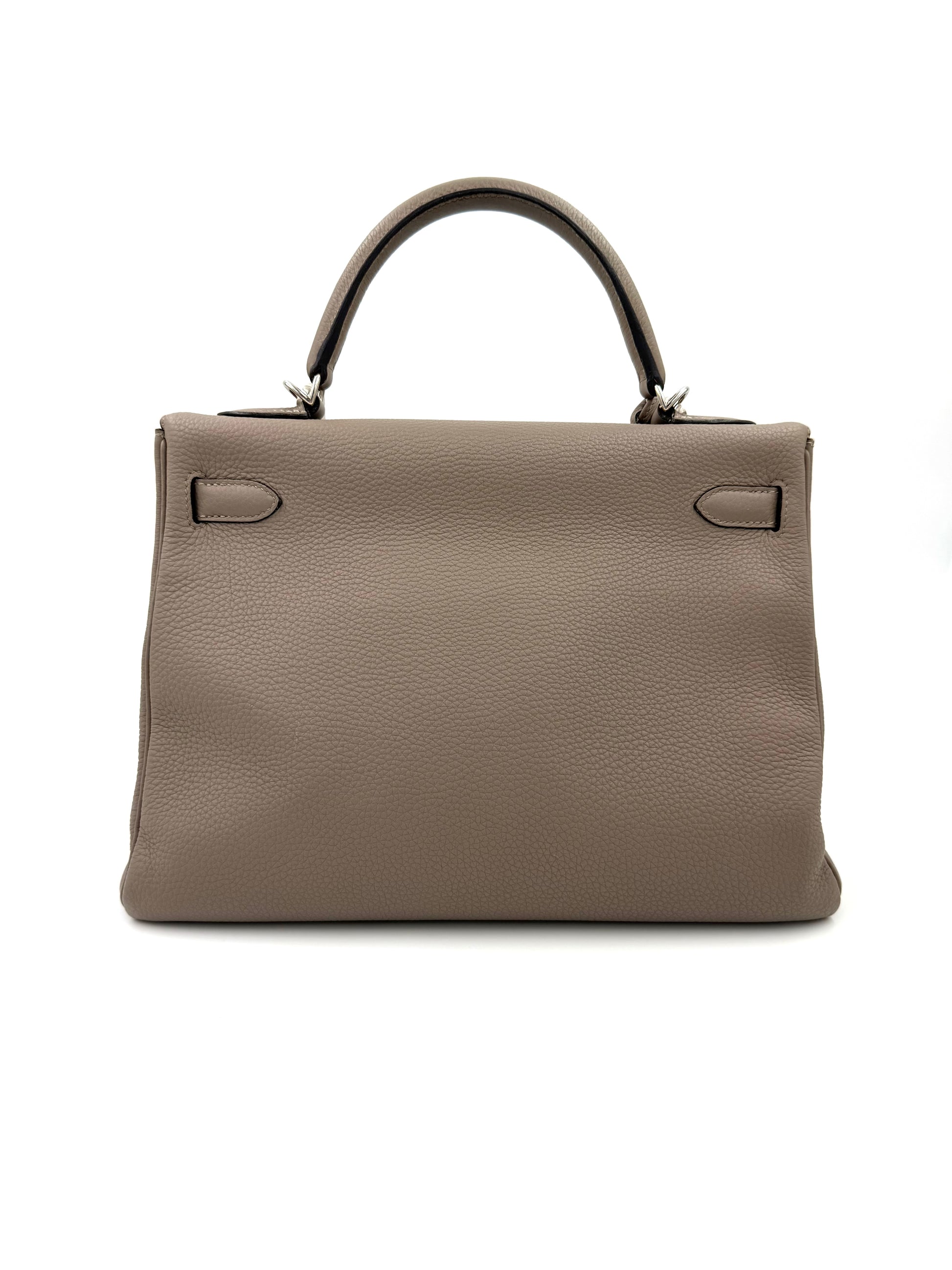 HERMÈS Kelly 32 Retourne Gris Asphalte PHW in Clemence Leder, elegante graue Luxushandtasche mit Palladium-Hardware.
