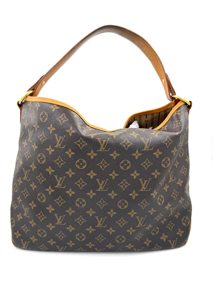 Louis Vuitton Delightful MM Monogram Canvas Handtasche aus robustem Canvas mit breitem Lederriemen und Karabinerverschluss.