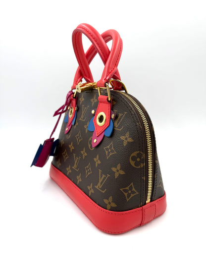 LOUIS VUITTON Alma BB Love Birds Designer Handtasche mit pink-roten Griffen und monogrammiertem Canvas-Material
