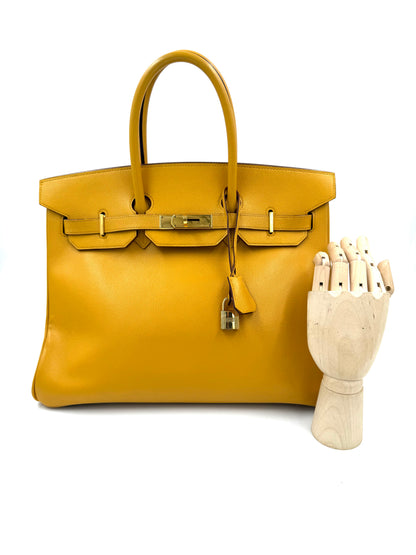 HERMÈS Birkin 35 Courchevel Gelb GHW gelbe Designerhandtasche aus zweiter Hand mit goldfarbenem Metall