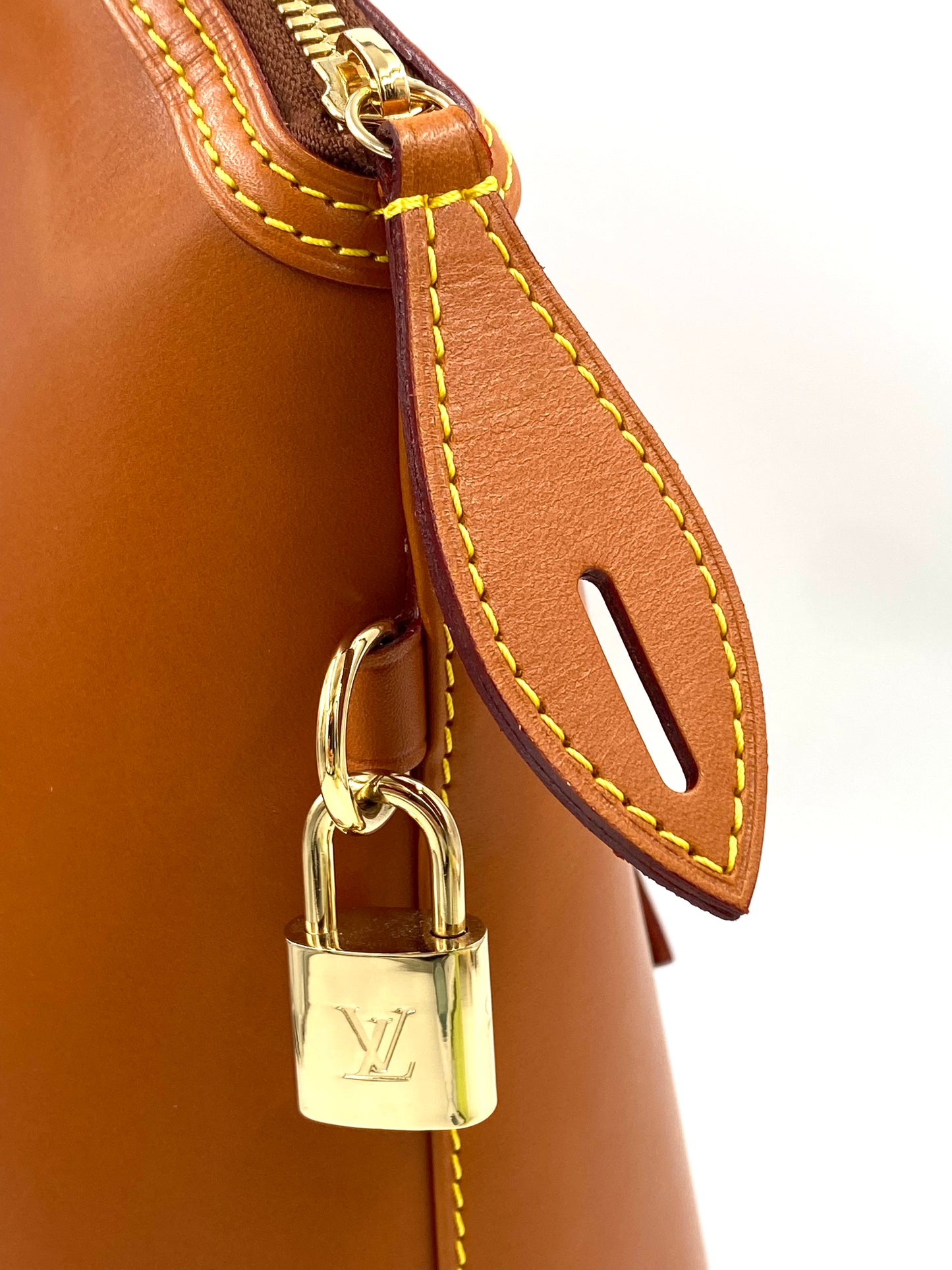 LOUIS VUITTON Lockit Vertical Nomade VVN Leder