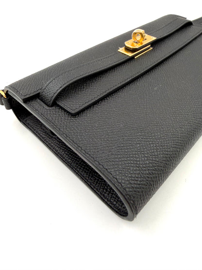 HERMÈS Kelly to Go Epsom schwarz GHW elegante schwarze Lederclutch mit goldenem Drehverschluss und tragbarem Riemen