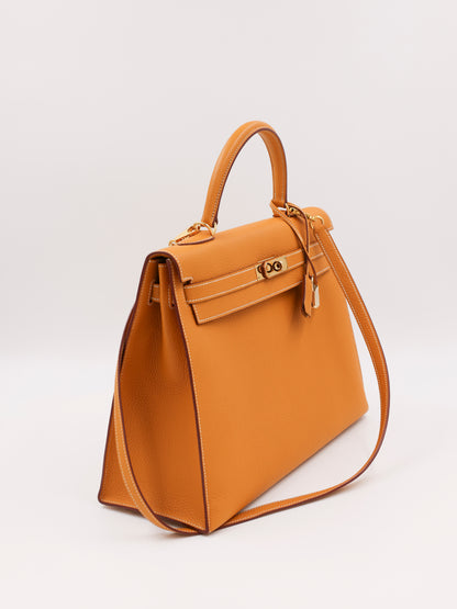 HERMÈS Kelly 35 senfgelb GHW
