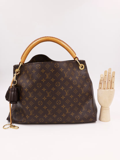 LOUIS VUITTON Artsy MM Monogram Canvas mit Tasselanhänger