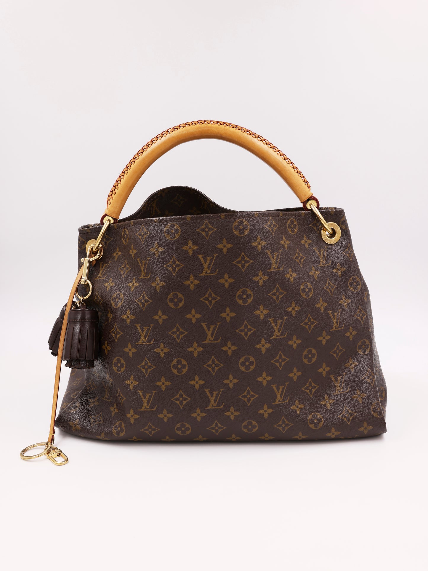 LOUIS VUITTON Artsy MM Monogram Canvas mit Tasselanhänger