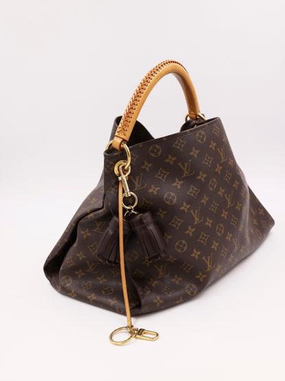 LOUIS VUITTON Artsy MM Monogram Canvas mit Tasselanhänger