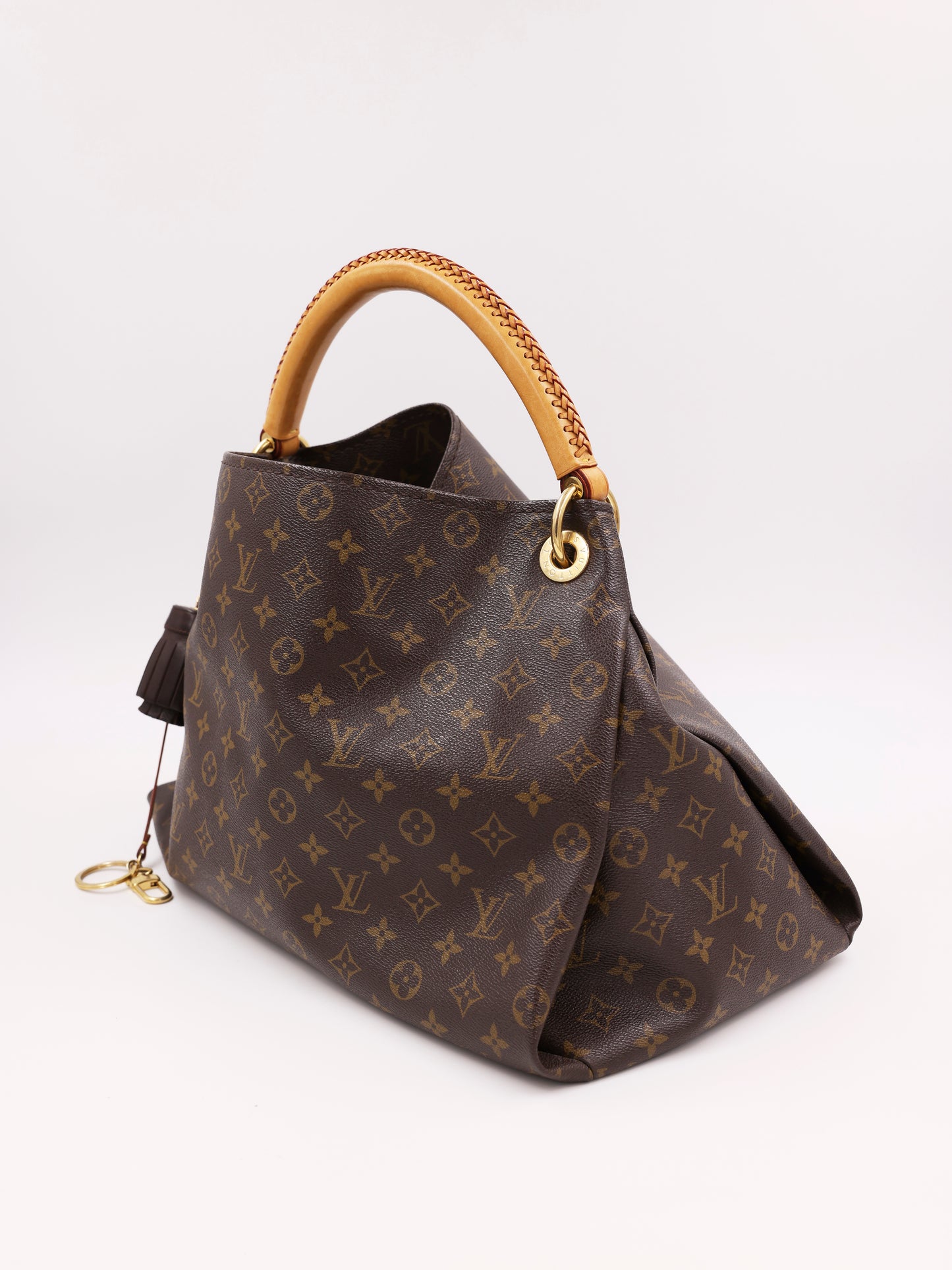 LOUIS VUITTON Artsy MM Monogram Canvas mit Tasselanhänger