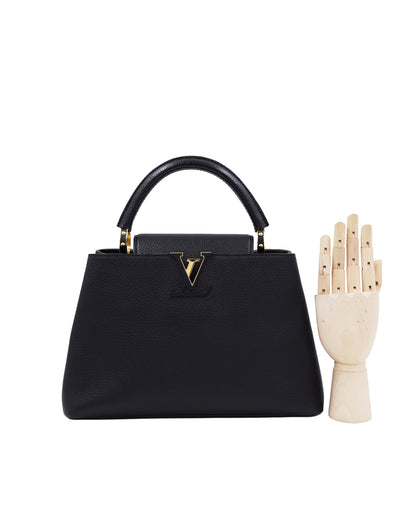 LOUIS VUITTON Capucines MM Taurillon schwarz, schwarze Designerhandtasche aus Leder