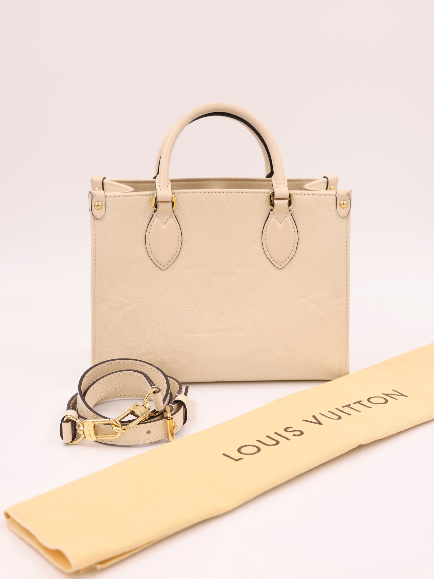 LOUIS VUITTON OnTheGo PM Monogram Empreinte Leder creme