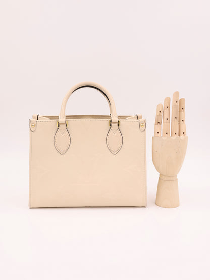 LOUIS VUITTON OnTheGo PM Monogram Empreinte Leder creme