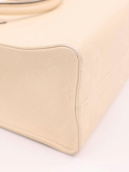 LOUIS VUITTON OnTheGo PM Monogram Empreinte Leder creme