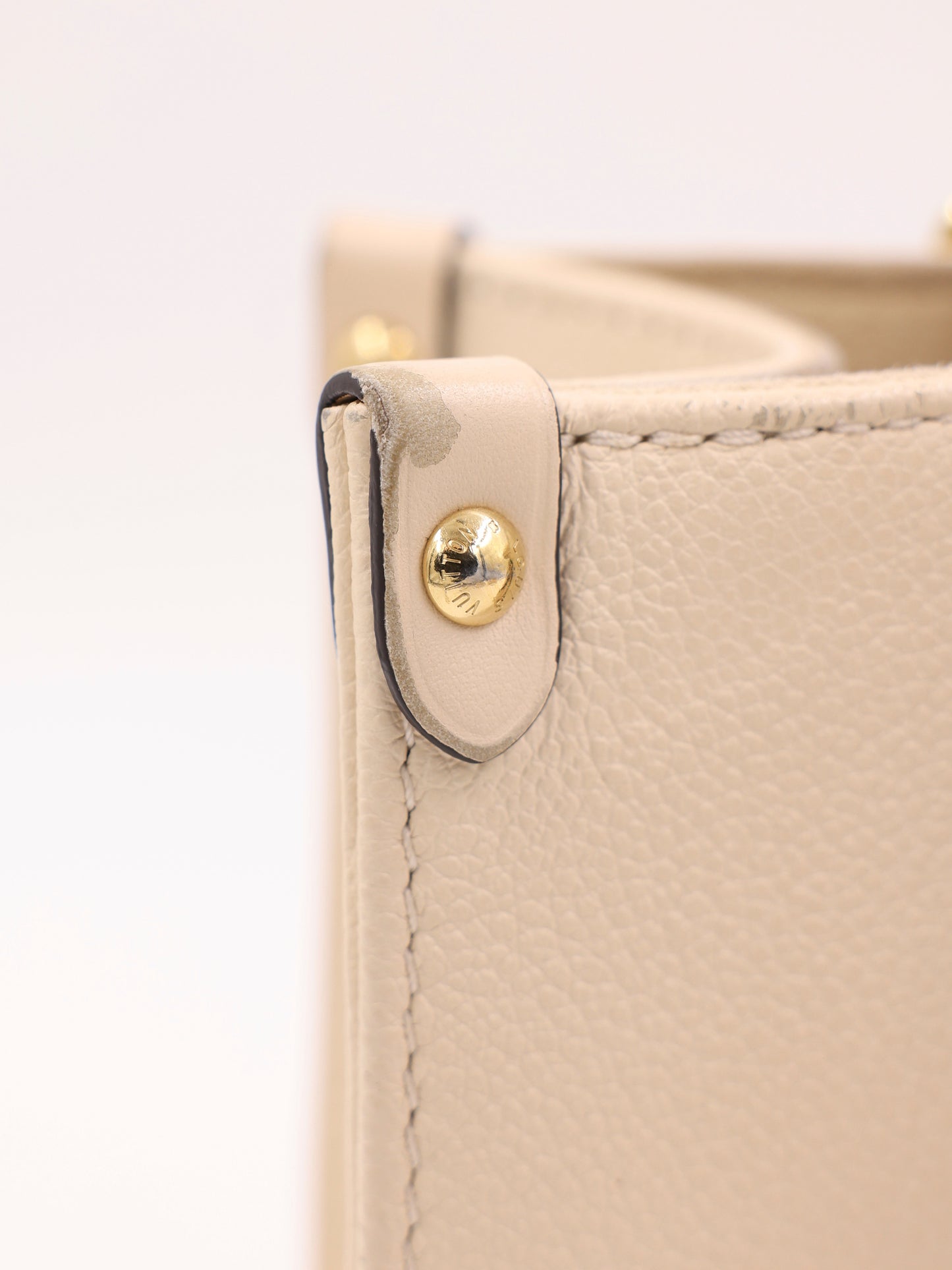 LOUIS VUITTON OnTheGo PM Monogram Empreinte Leder creme