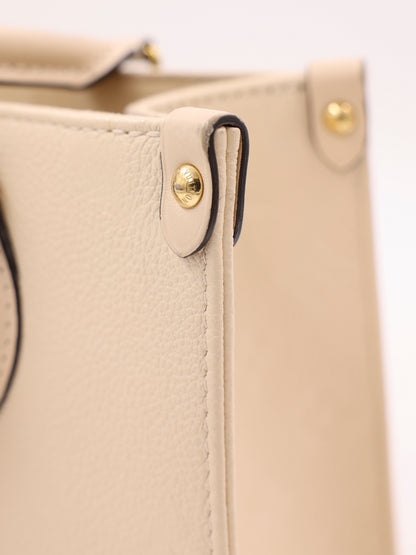 LOUIS VUITTON OnTheGo PM Monogram Empreinte Leder creme