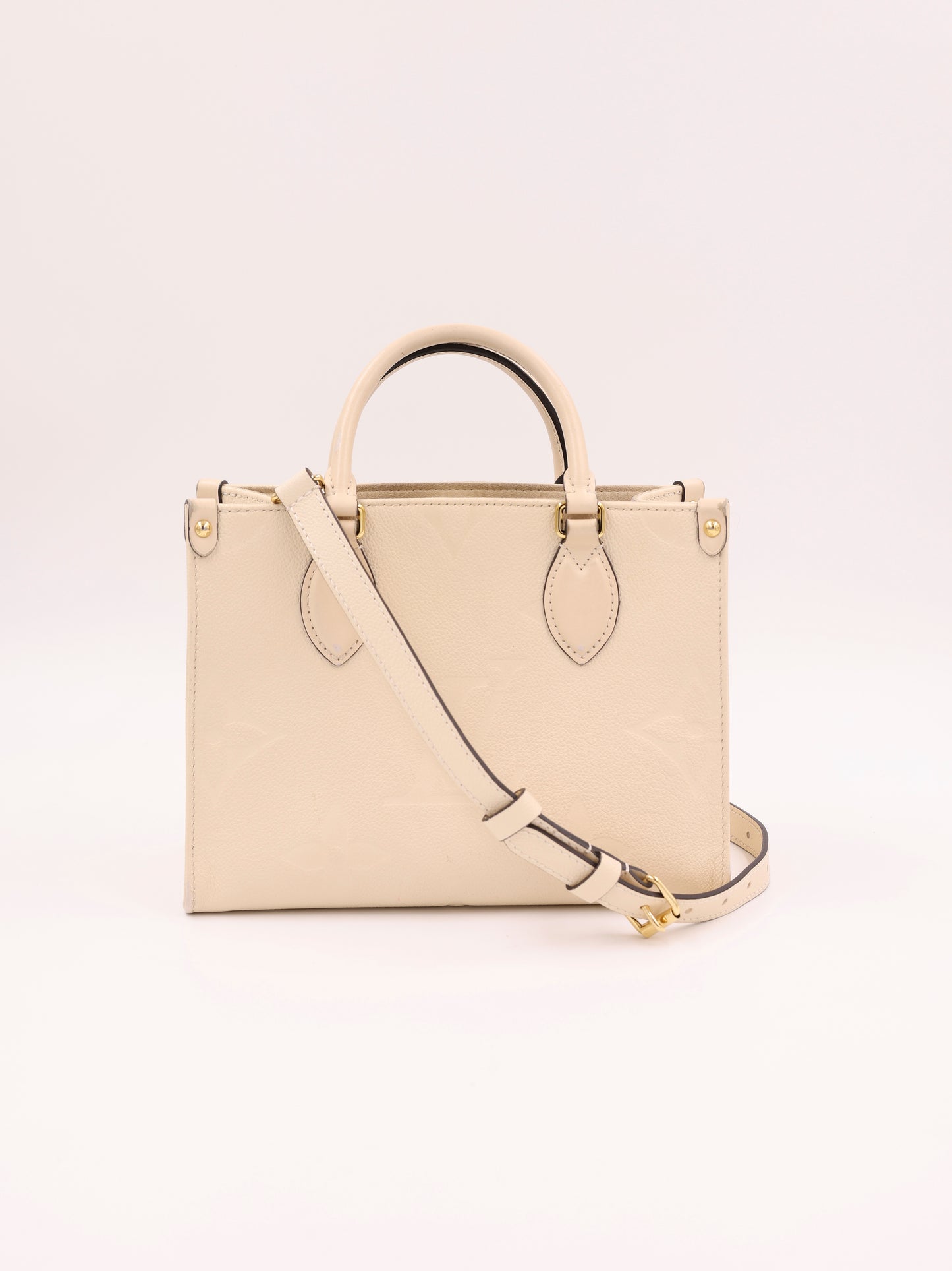 LOUIS VUITTON OnTheGo PM Monogram Empreinte Leder creme