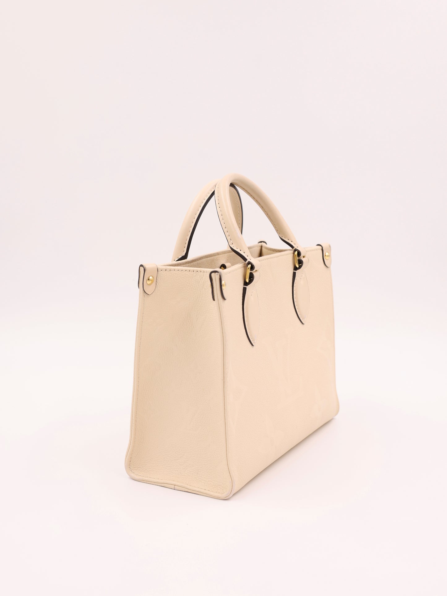 LOUIS VUITTON OnTheGo PM Monogram Empreinte Leder creme