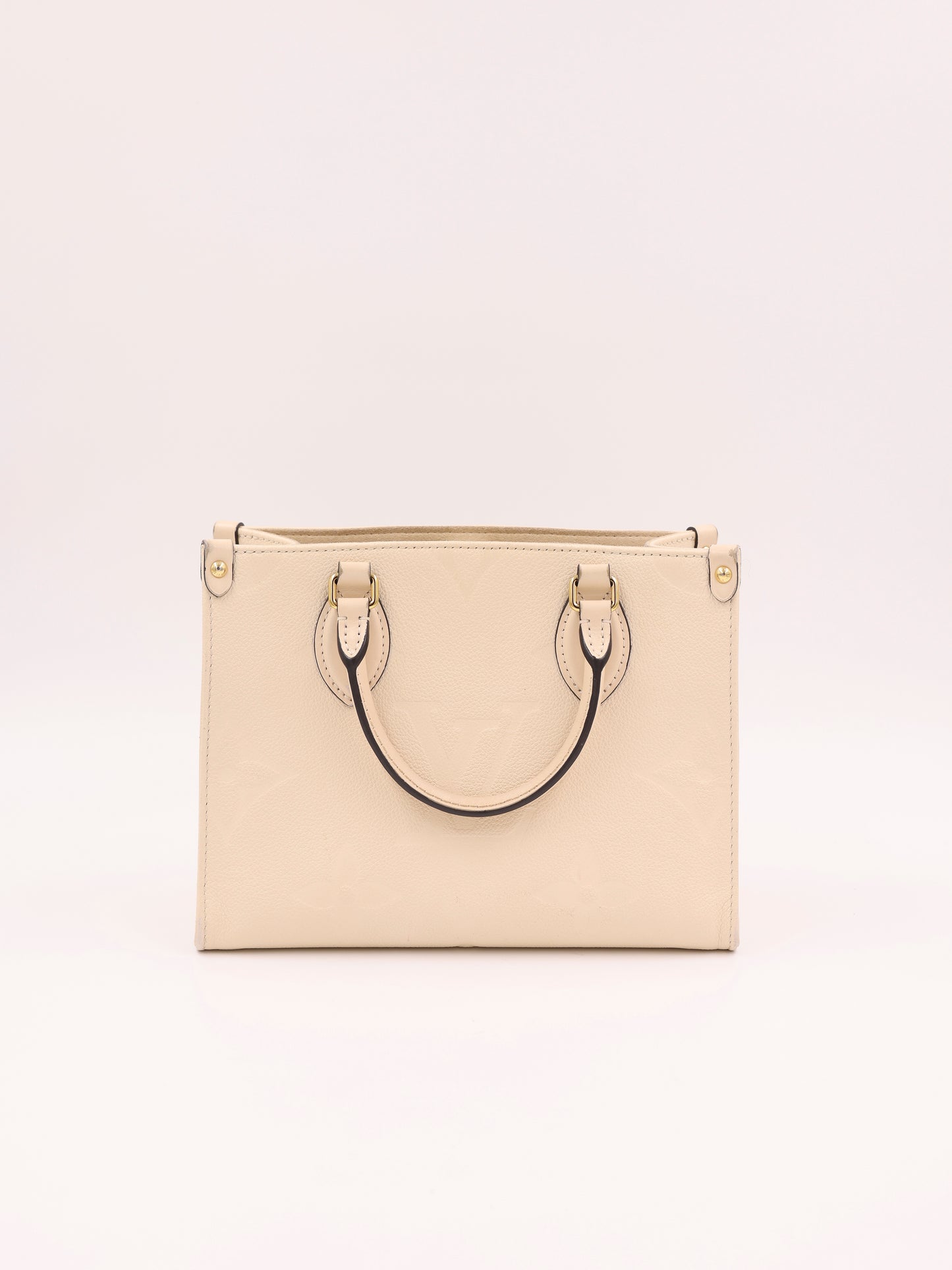 LOUIS VUITTON OnTheGo PM Monogram Empreinte Leder creme
