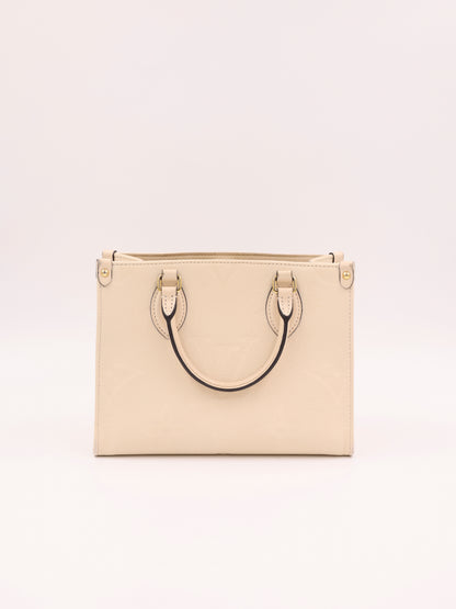 LOUIS VUITTON OnTheGo PM Monogram Empreinte Leder creme