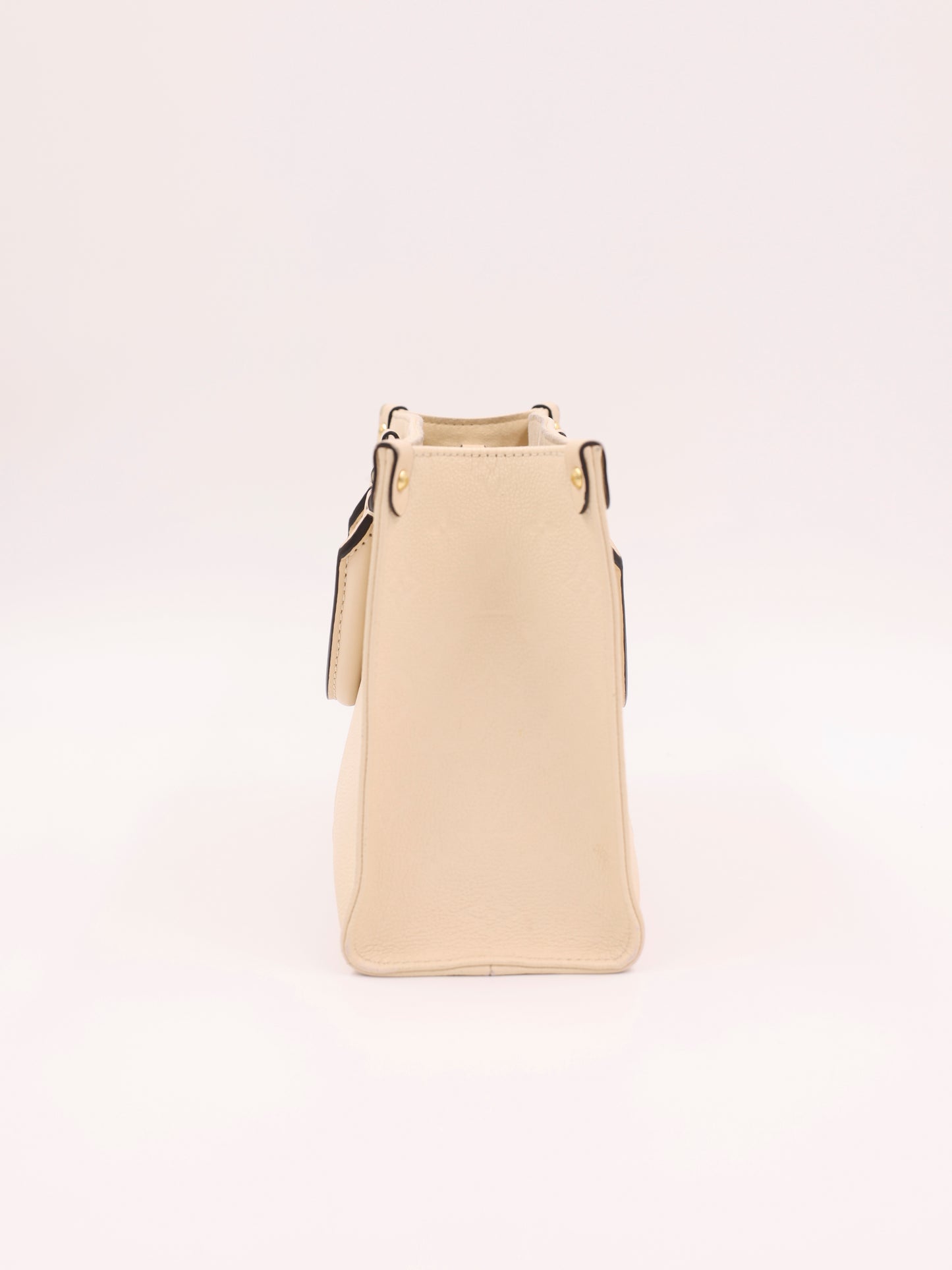 LOUIS VUITTON OnTheGo PM Monogram Empreinte Leder creme