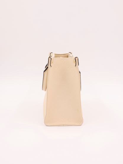LOUIS VUITTON OnTheGo PM Monogram Empreinte Leder creme