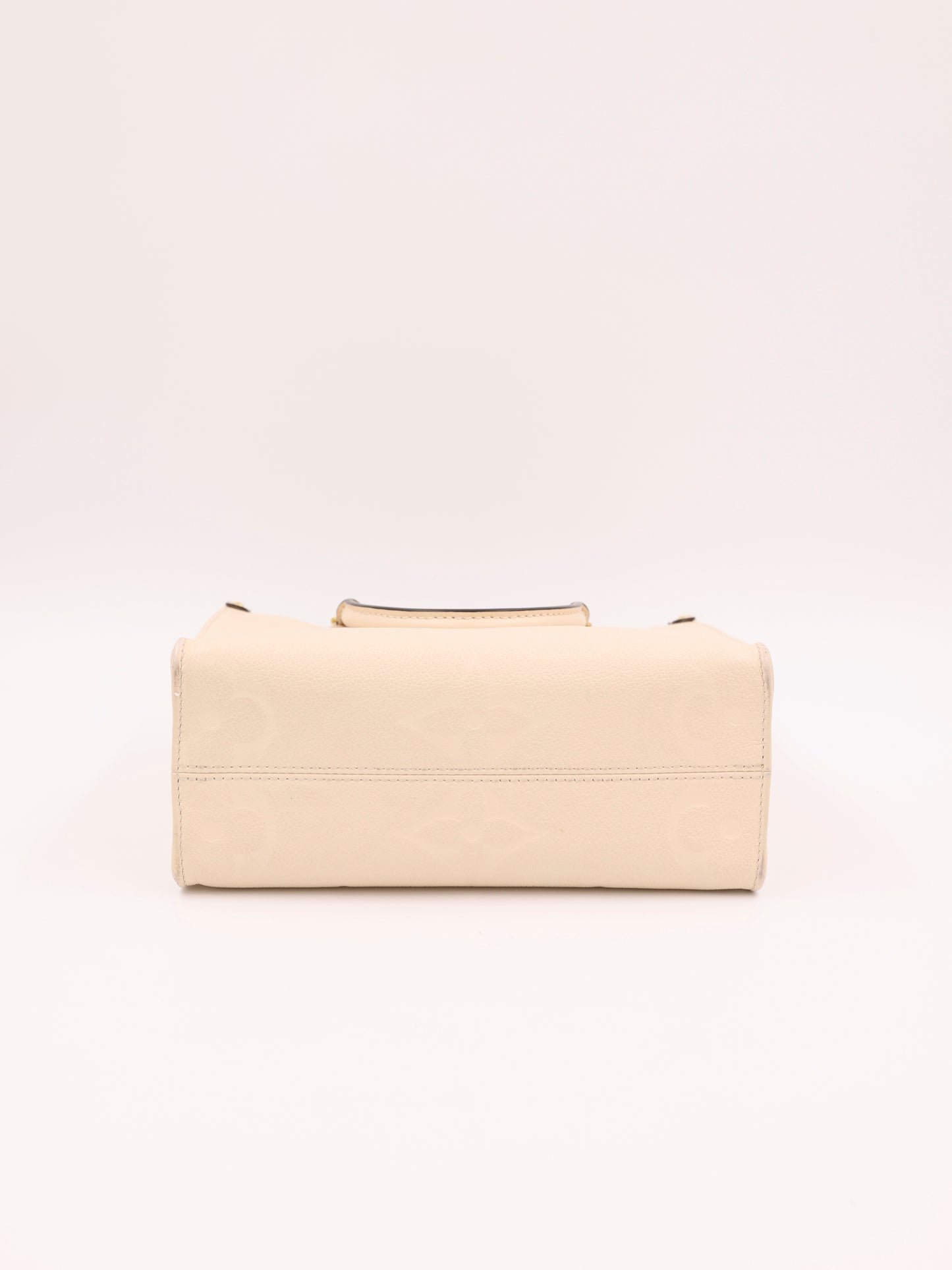 LOUIS VUITTON OnTheGo PM Monogram Empreinte Leder creme