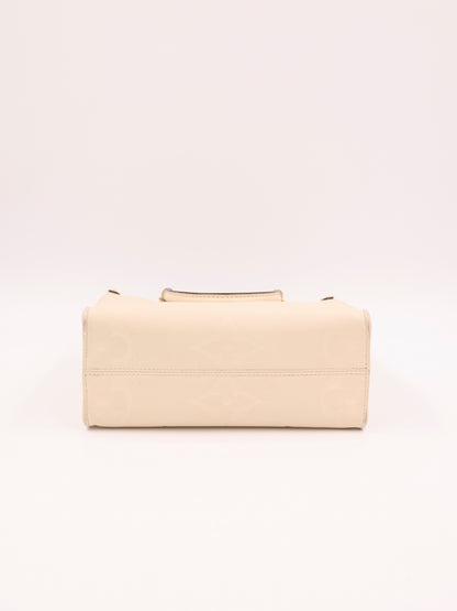 LOUIS VUITTON OnTheGo PM Monogram Empreinte Leder creme