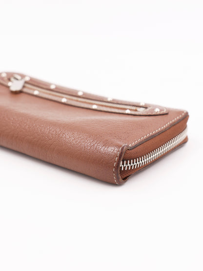 LOUIS VUITTON Suhali Zippy braun