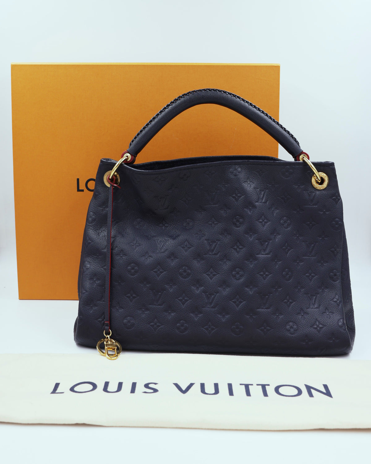LOUIS VUITTON Artsy MM Monogram Empreinte dunkelblau als elegante Designerhandtasche
