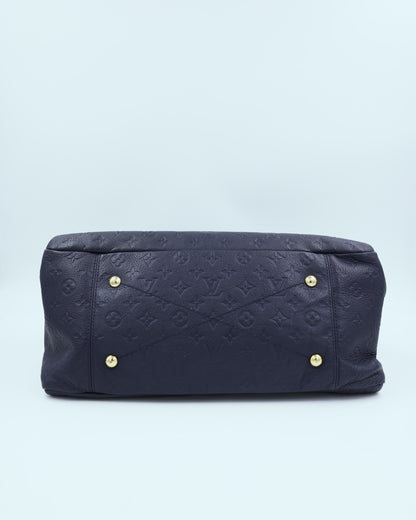LOUIS VUITTON Artsy MM Monogram Empreinte dunkelblau Unterseite der Designerhandtasche